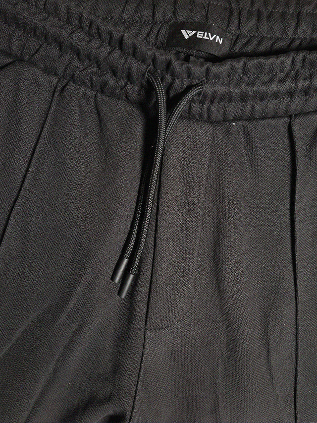 Elvn Drawstring Trousers with Piping Detail